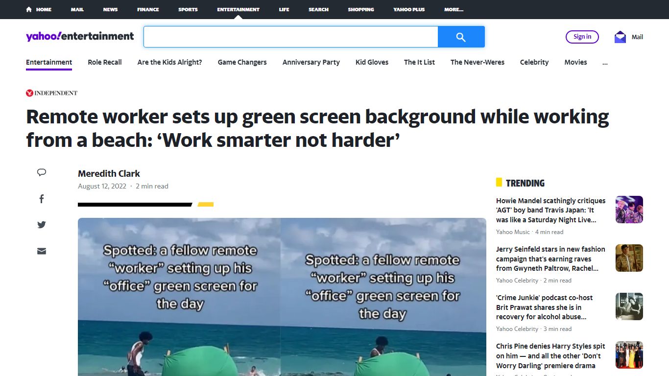 Remote worker sets up green screen background while working from a ...